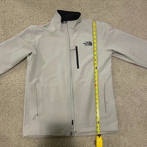 North Face Zip Up Jacket Grey, white, cream color size small little scratch near